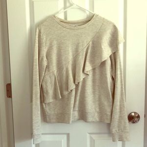 Cute sweatshirt with ruffle detail.